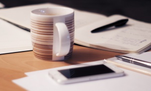 Paperwork Scattered on Desk